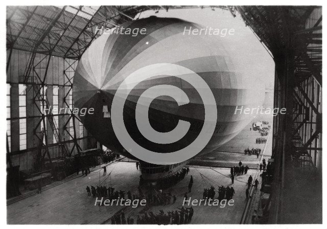 Zeppelin LZ 127 'Graf Zeppelin' entering its hangar, 1933. Artist: Unknown