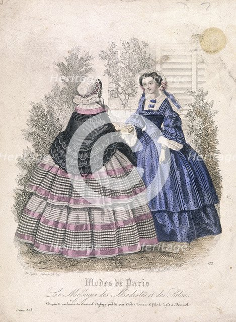 Two women wearing the latest fashions in a garden setting, 1858. Artist: Anon