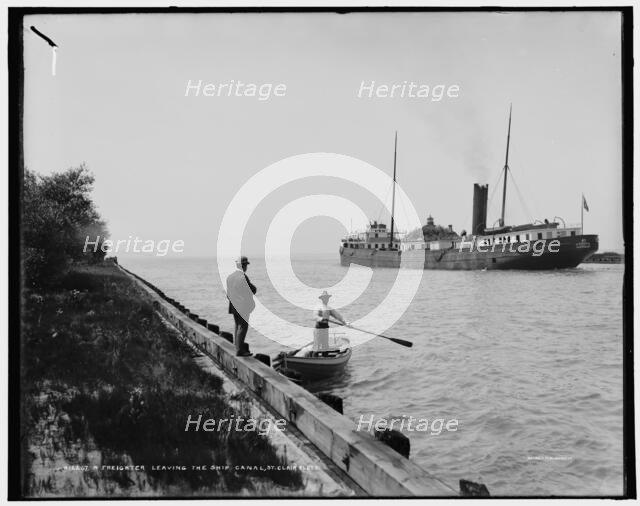 A Freighter leaving the ship canal, St. Clair Flats, between 1890 and 1901. Creator: Unknown.