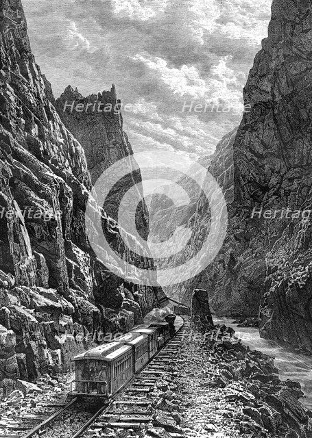 A train passing through the Rocky Mountains, USA, 19th century.Artist: Taylor