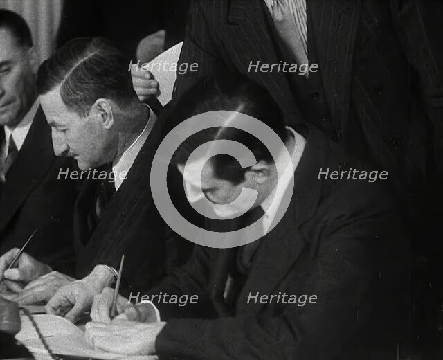 Wendell Willkie Signing an Agreement Allowing the USA to use British Naval Bases..., 1941. Creator: British Pathe Ltd.