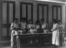 Carlisle Indian School, Carlisle, Pa. Cooking class, 1901. Creator: Frances Benjamin Johnston.