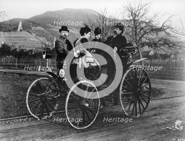 Karl Benz with his wife Bertha in a Benz-Viktoria, 1893. Artist: Unknown