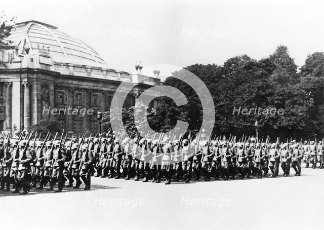 German troops parading before the German commandant of Paris, 8 July 1941. Artist: Unknown