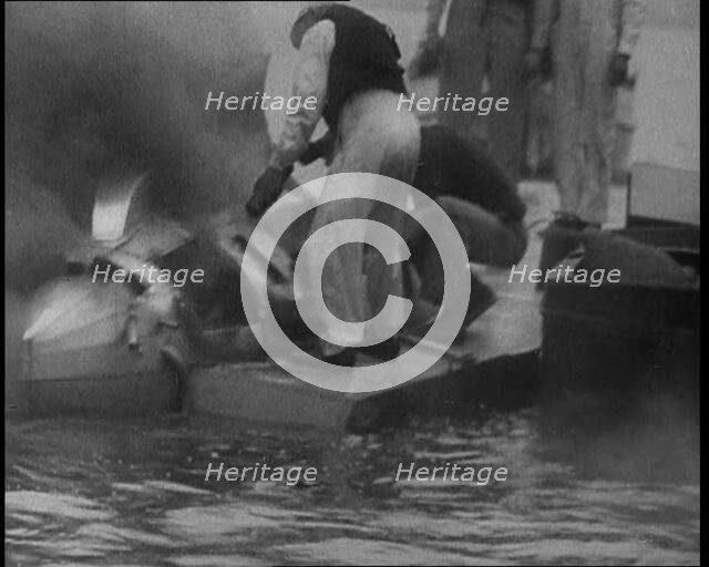 Men Extinguishing a Fire , 1933. Creator: British Pathe Ltd.