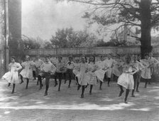 School children learning a dance in a school yard, Washington, D.C., (1899?). Creator: Frances Benjamin Johnston.