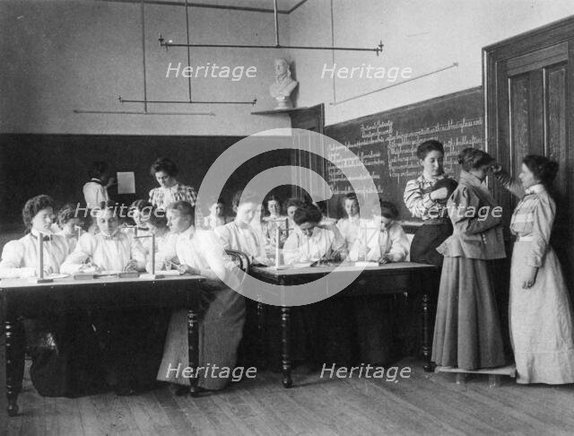Group of young women studying static electricity in normal school, Washington, D.C., (1899?). Creator: Frances Benjamin Johnston.