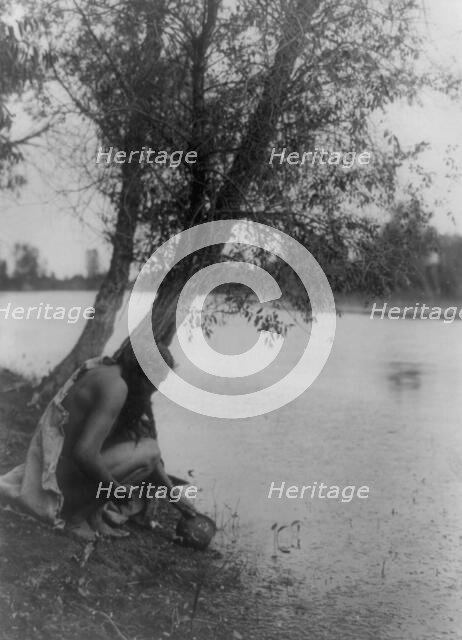 He perceived an earthen vessel, c1908. Creator: Edward Sheriff Curtis.
