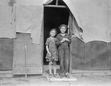 Migrant family in Kern County, California, 1936. Creator: Dorothea Lange.