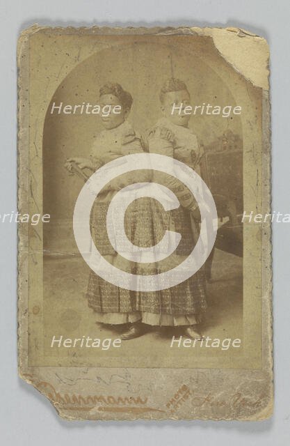 Albumen print of Millie and Christine McCoy, 1880s -1890s. Creator: Charles Eisenmann.