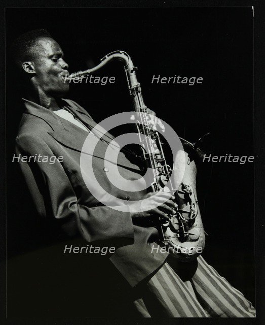 Steve Williamson playing tenor saxophone at the Forum Theatre, Hatfield, Hertfordshire, 1990. Artist: Denis Williams