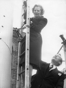 Margaret Thatcher climbs up a chimney stack, Lambeth, 14th April 1978. Artist: Unknown