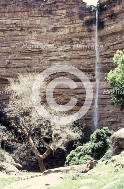 Waterfall before rain, Bandiagara Escarpment, Pays Dogon, Mali, 1990. Creator: Amanda Waite.