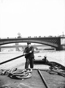 Lighter on the Thames going downstream towards Southwark Bridge, London, c1905. Artist: Unknown