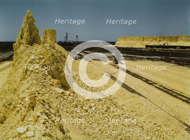 Nearly exhausted sulphur vat from which railroad..., Freeport Sulphur Co, Hoskins Mound, Texas, 1943 Creator: John Vachon.