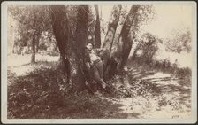 F.A. Williams resting against a tree, 1892. Creator: Unknown.