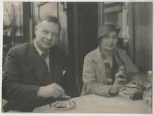 Natalia Goncharova and Mikhail Larionov at the Restaurant Petit Saint-Benoît, 1932. Creator: Anonymous.