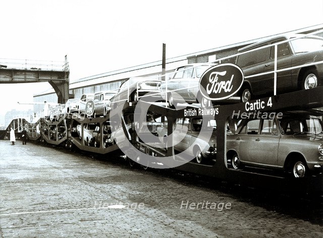 Group of engineers, engine drivers and members of the Company, with the train engine that made th…