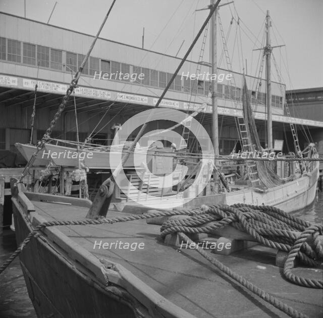 A scene at the Fulton fish market, New York, 1943. Creator: Gordon Parks.