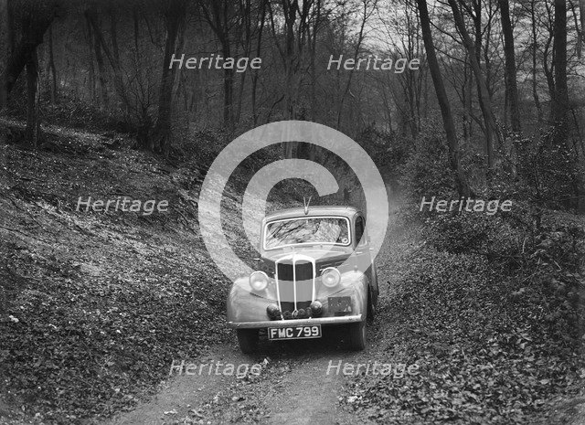 Standard Twelve competing in the Standard Car Owners Club Southern Counties Trial, 1938. Artist: Bill Brunell.