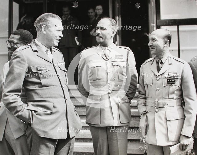 General Sir Richard Hull, Chief of the General Staff talking with Lt-Col. J.C.H. Serette..., 1964. Creator: Unknown.