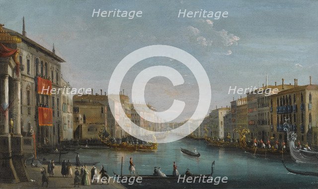 View of the Grand Canal from the Palazzo Balbi looking toward the Rialto Bridge with a Regatta.