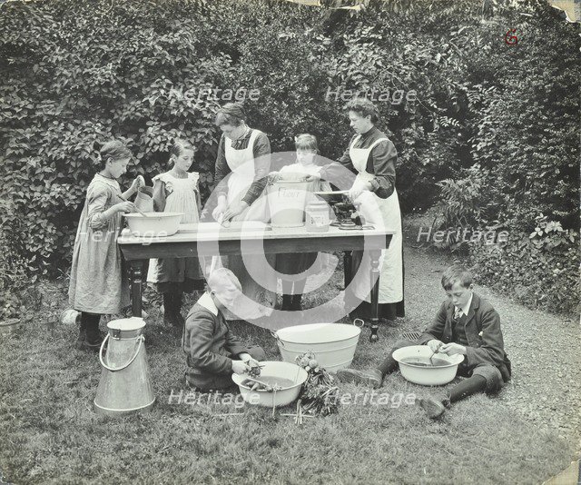 Pupils preparing food outdoors, Birley House Open Air School, Forest Hill, London, 1908. Artist: Unknown.