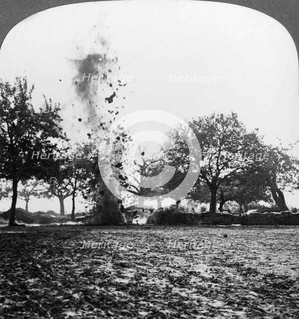 A German shell exploding, World War I, 1914-1918.Artist: Realistic Travels Publishers