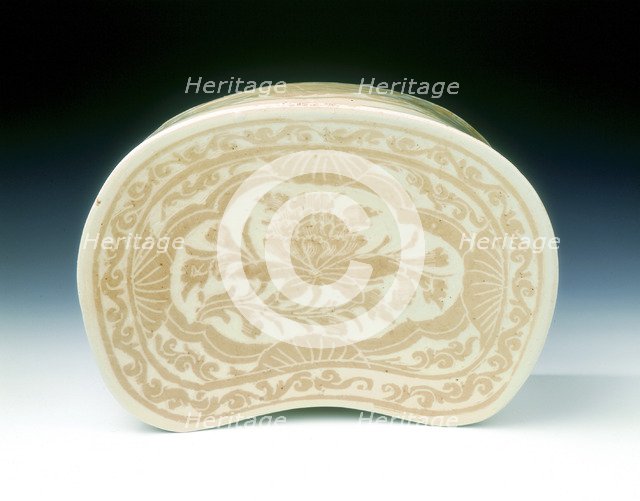 Ding bean-shaped pillow with sgraffito lotus design, Jin dynasty, China, 12th century. Artist: Unknown