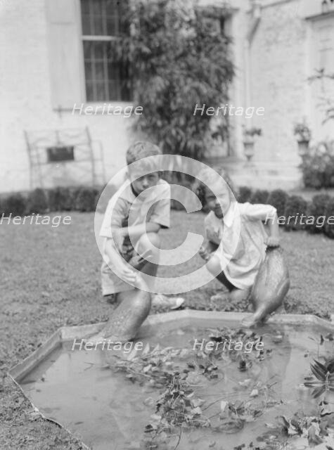 Children of Victor Harris, outdoors, 1932. Creator: Arnold Genthe.