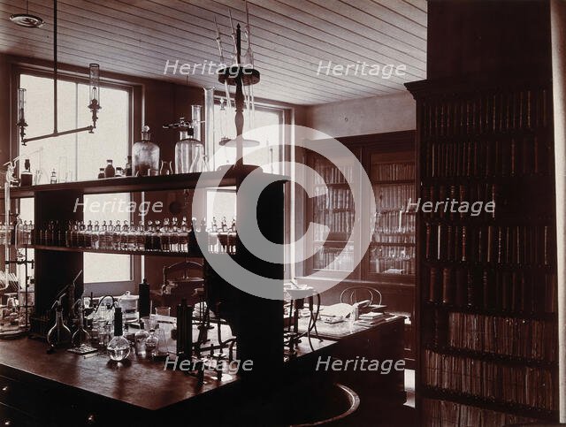 The interior of a pharmaceutical or chemical laboratory with a bench..., c1890s. Creator: Unknown.