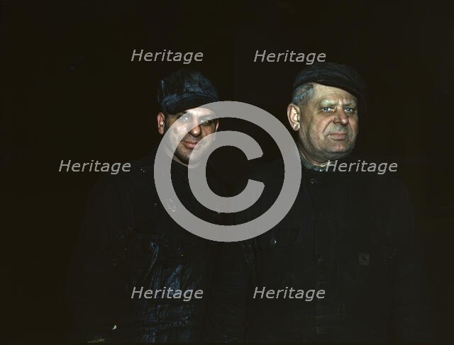 Two employees at the roundhouse at Proviso yard, C & NW RR, Chicago, Ill., 1942. Creator: Jack Delano.