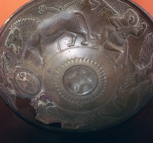 Detail of a lion-hunt on the inside of a bronze bowl, 8th century BC. Artist: Unknown