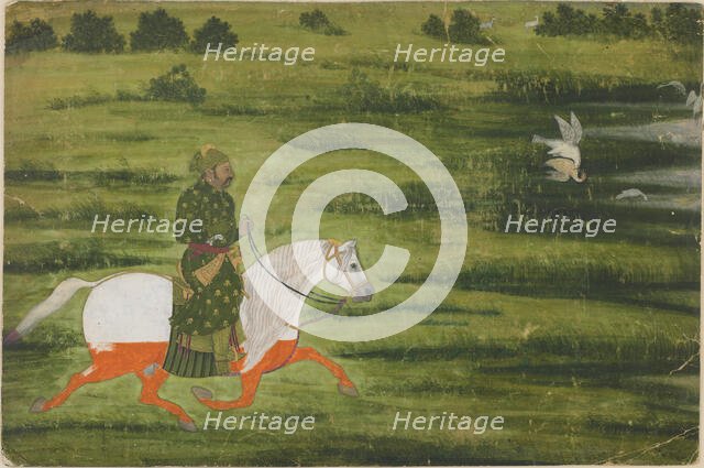 A mounted man hunting birds with a falcon, early 18th century. Creator: Unknown.