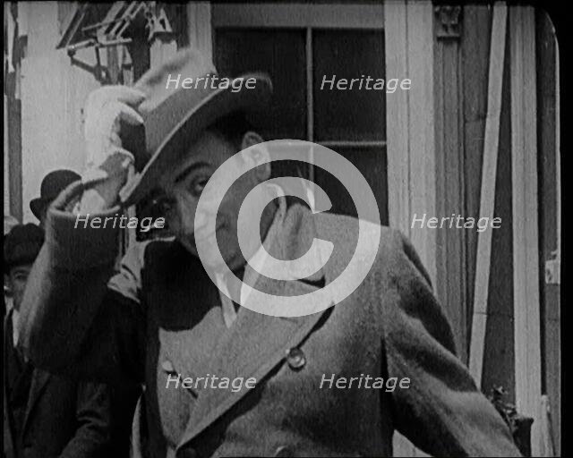 Singer Enrico Carruso Standing in the Street in the United States of America, 1921. Creator: British Pathe Ltd.