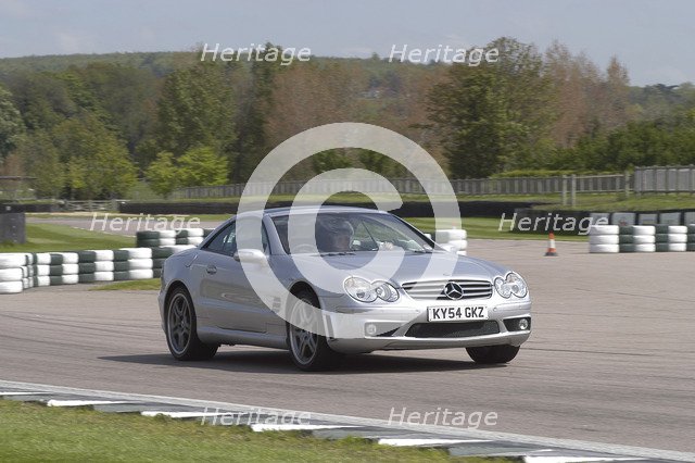 2004 Mercedes Benz 600 SLV12 Artist: Unknown.