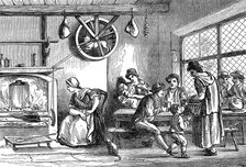 Turnspit dog at work in the inn at Newcastle, Carmarthen, Wales, c1800 (1869). Artist: Unknown