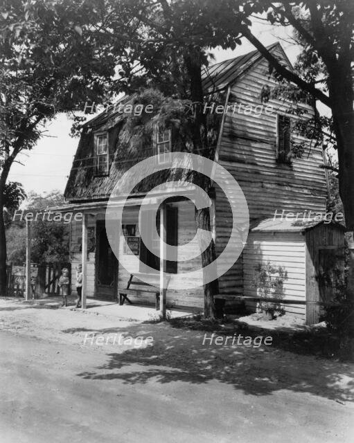 Mrs. Ellis' store, Falmouth, Virginia, between 1933 and 1942. Creator: Frances Benjamin Johnston.