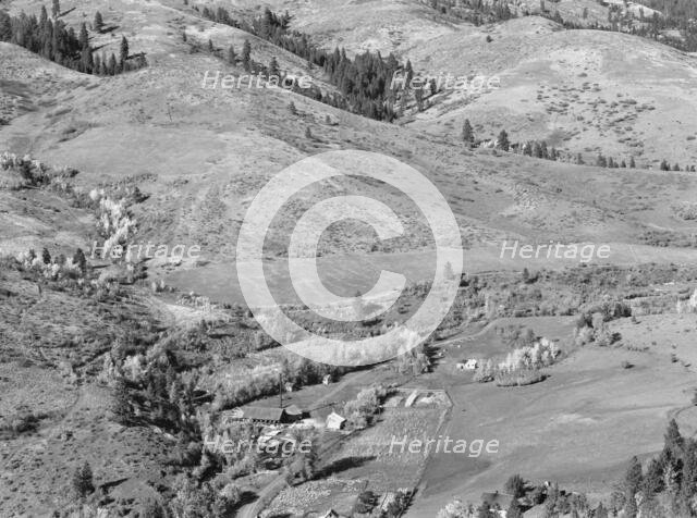 Possibly: Looking down on Ola self-help co-op mill showing the upper end..., Gem County, Idaho, 1939 Creator: Dorothea Lange.