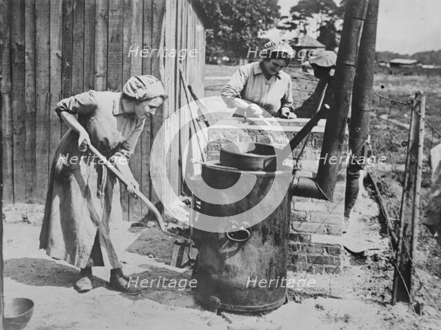 British women tending fat boilers at front, 24 Jul 1917. Creator: Bain News Service.