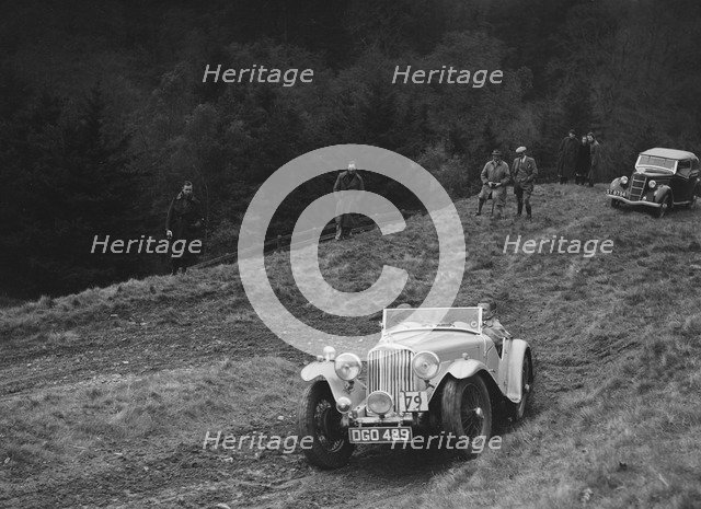 AC of LP Jaques competing in the MCC Edinburgh Trial, Roxburghshire, Scotland, 1938. Artist: Bill Brunell.