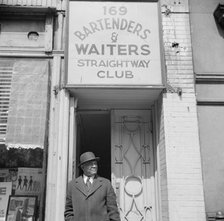 Bartenders' and waiters' club entrance in the Harlem area, New York, 1943. Creator: Gordon Parks.