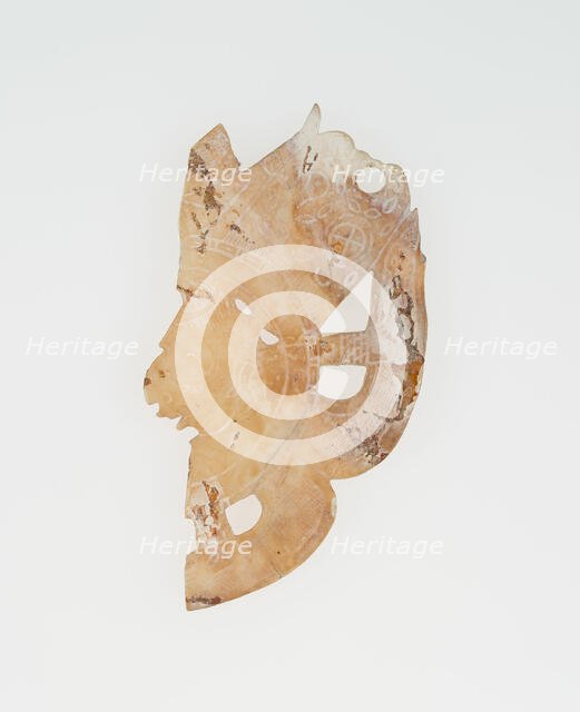 Carved Shell Depicting the Profile Face of Diety (Broken), A.D. 250/900. Creator: Unknown.