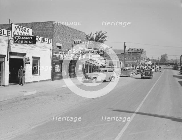 Saturday afternoon, main street of Nyssa, Oregon, 1939. Creator: Dorothea Lange.