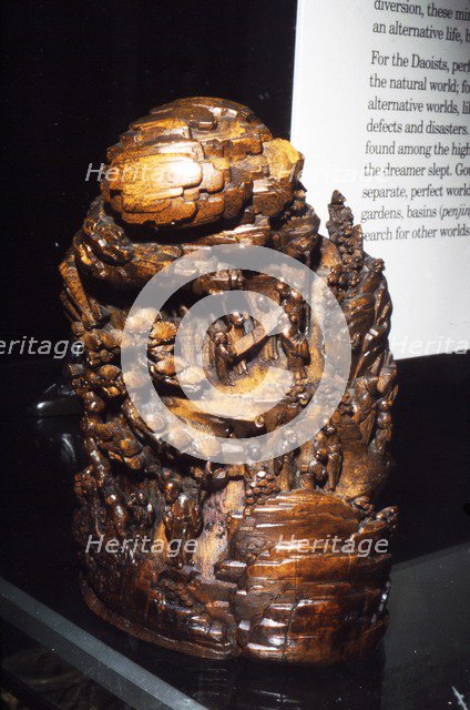 Chinese carving, Mountain with Daoist Immortals examing Ying Yang Diagram,  18th century Artist: Unknown.