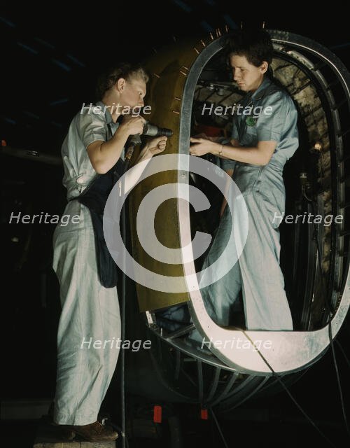 Frances Eggleston, aged 23, came from Oklahoma...Consolidated Aircraft Corp., Fort Worth, TX, 1942. Creator: Howard Hollem.