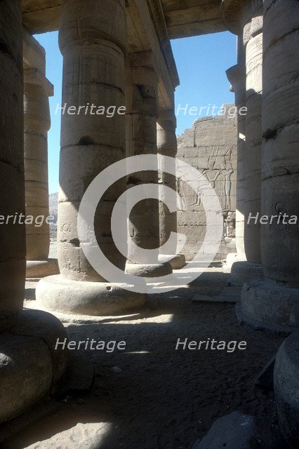 View through to relief of Rameses II before Amun & Mut, Temple of Rameses II, Luxor, Egypt. Artist: Unknown