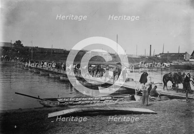 Spahis cross boat bridge, Compiegne, 1914. Creator: Bain News Service.