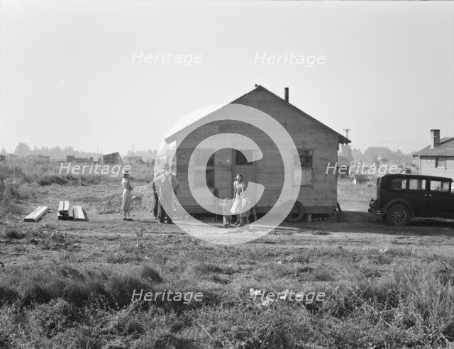 Mother and two children, husband, his brother and brother's..., near Klamath Falls, Oregon, 1939. Creator: Dorothea Lange.