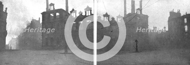 'La destruction methodique de Reims; L'Hotel de Ville en feu, apres le bombardement du 3 ma..., 1917 Creator: Unknown.